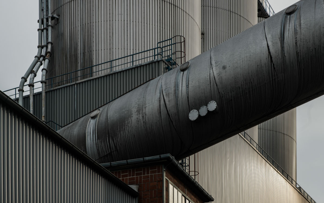 a large metal pipe with a ladder